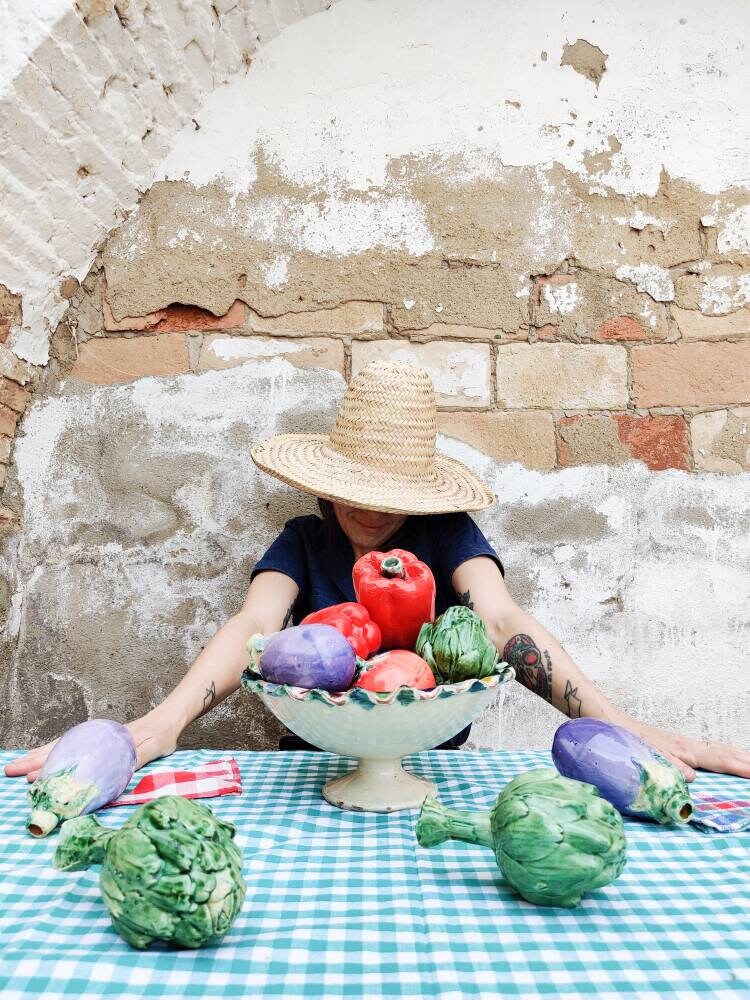 Ceramic vegetables in fruit bowl