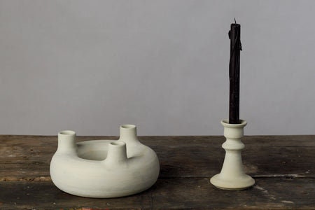 White ceramic candlestick holders with handle